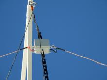 Centre insulator hauled to the top of the pole